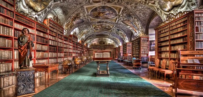 A grand library, filled with books.